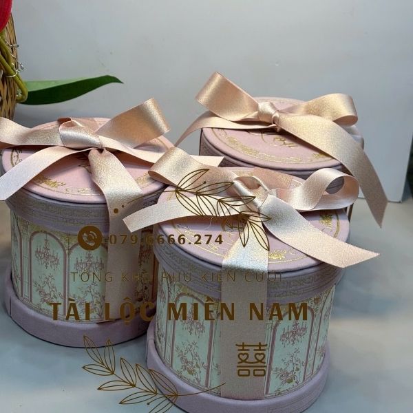 Lon trà tròn nơ hồng