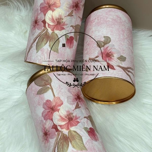 Lon tròn hoa nổi to hồng 200g